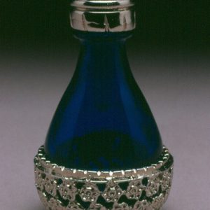 The Roma Line of Basket Style Tear Bottle Blue with Silver