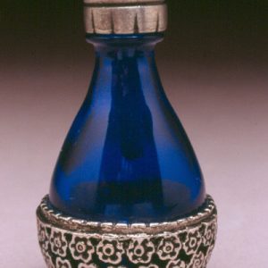 The Roma Line of Basket Style Tear Bottle Blue with Pewter
